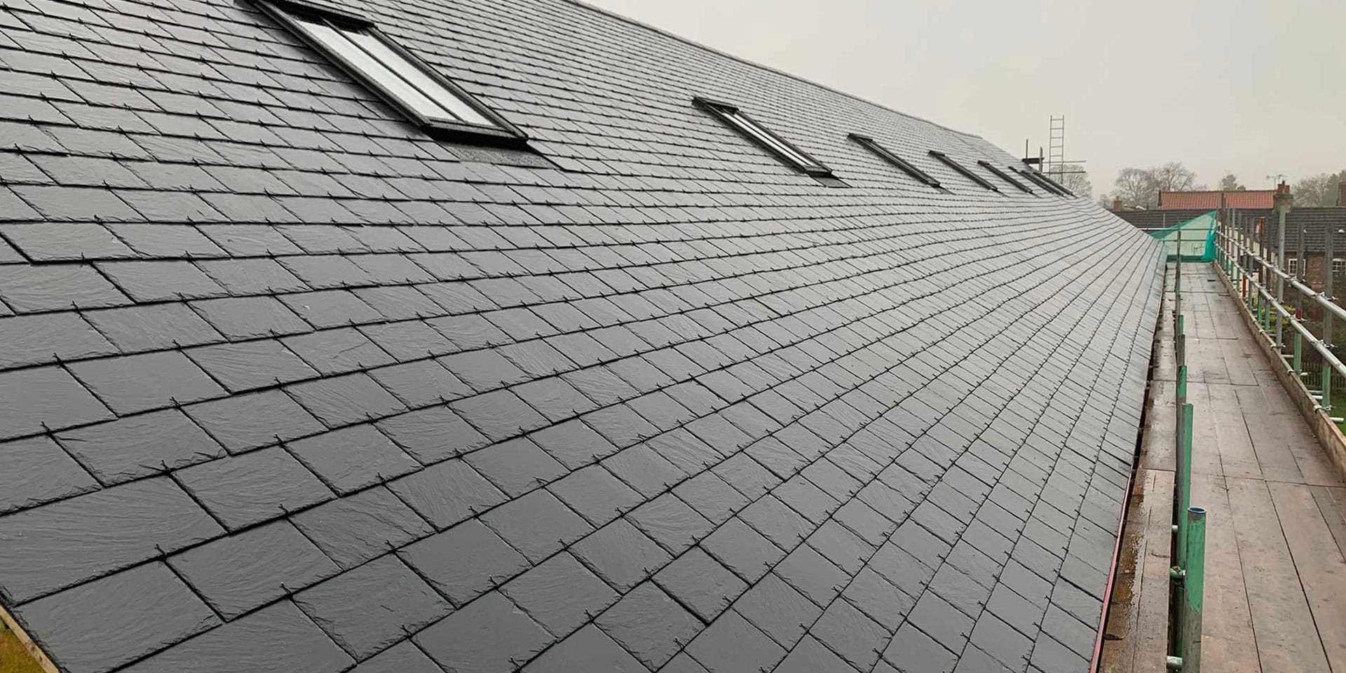A new slate roof with roof windows